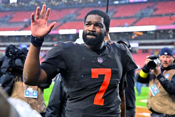 Jacoby Brissett waves to the crowd as he leaves the field after a victory over the Bucs